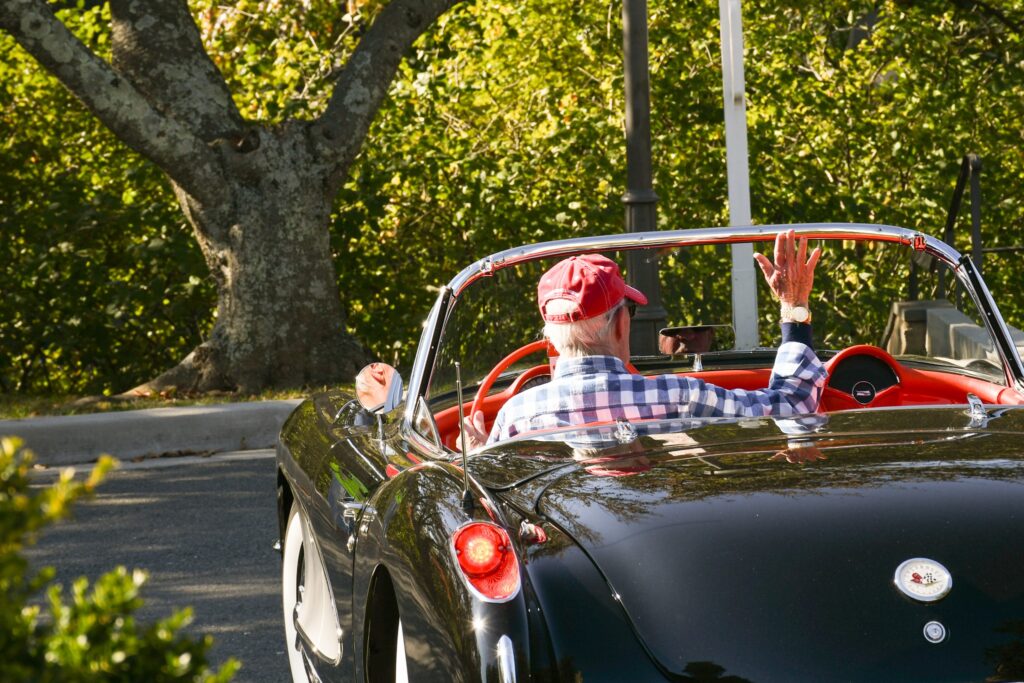 Cal Milans driving his 1957 Chevrolet Corvette