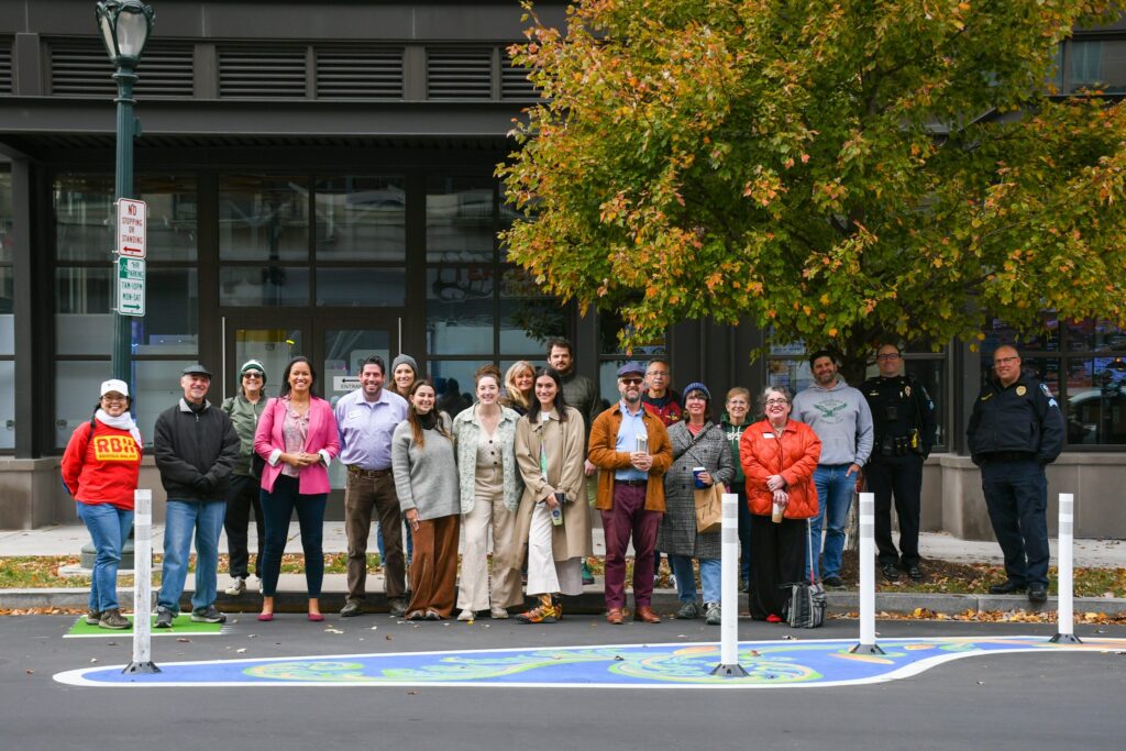 Group photo of Rockville Mayor and Council and the public in Town Center