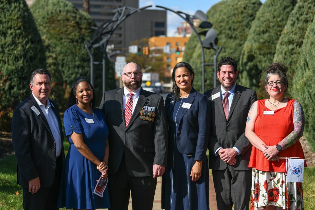 Mayor and Council with retired Air Force Master Sgt Dominic Russoli at the 2024 Veterans Day ceremony