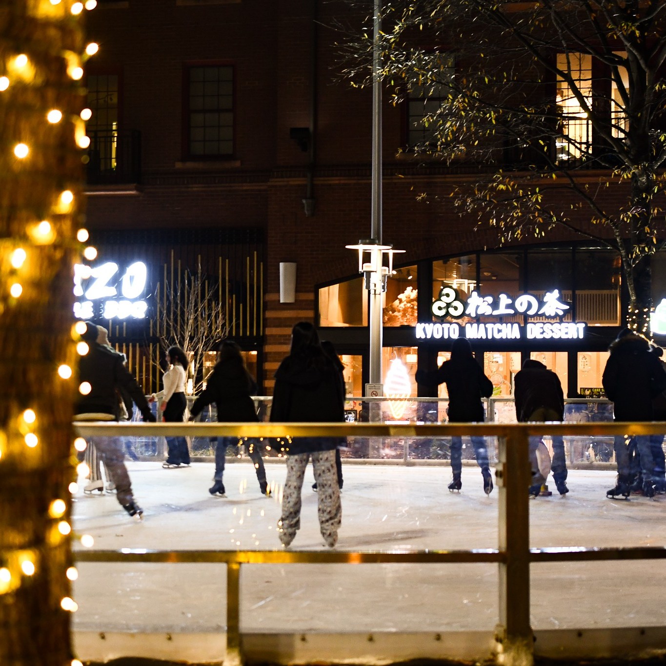People skating on the ice rink in Rockville Town Square