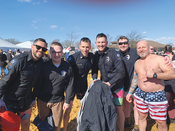 Image depicts members of Rockville City Police Department at the Polar Bear Plunge.