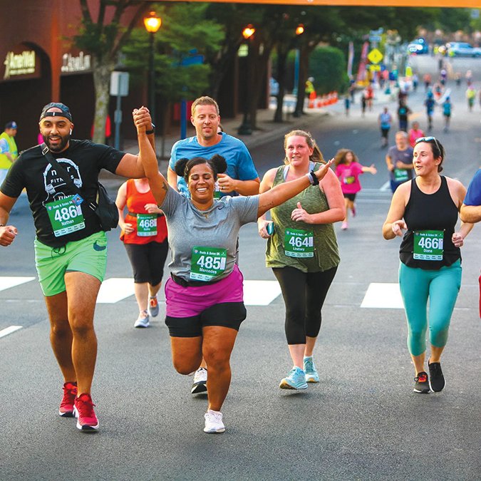 Runners finishing Suds and Soles 5K
