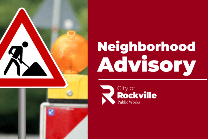 A road work sign and caution light appear next to a red notice reading 