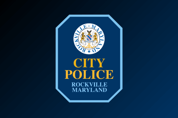 A blue badge with the seal of Rockville, Maryland at the top and the text 