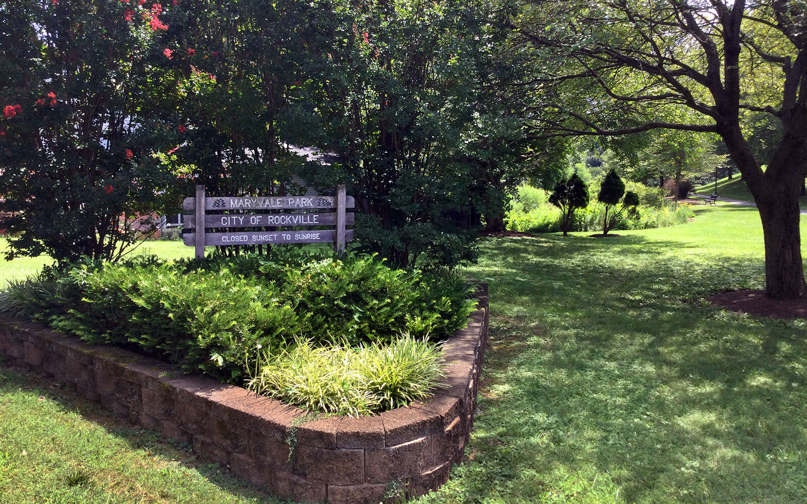 Entrance sign for Maryvale Park in a landscaped garden
