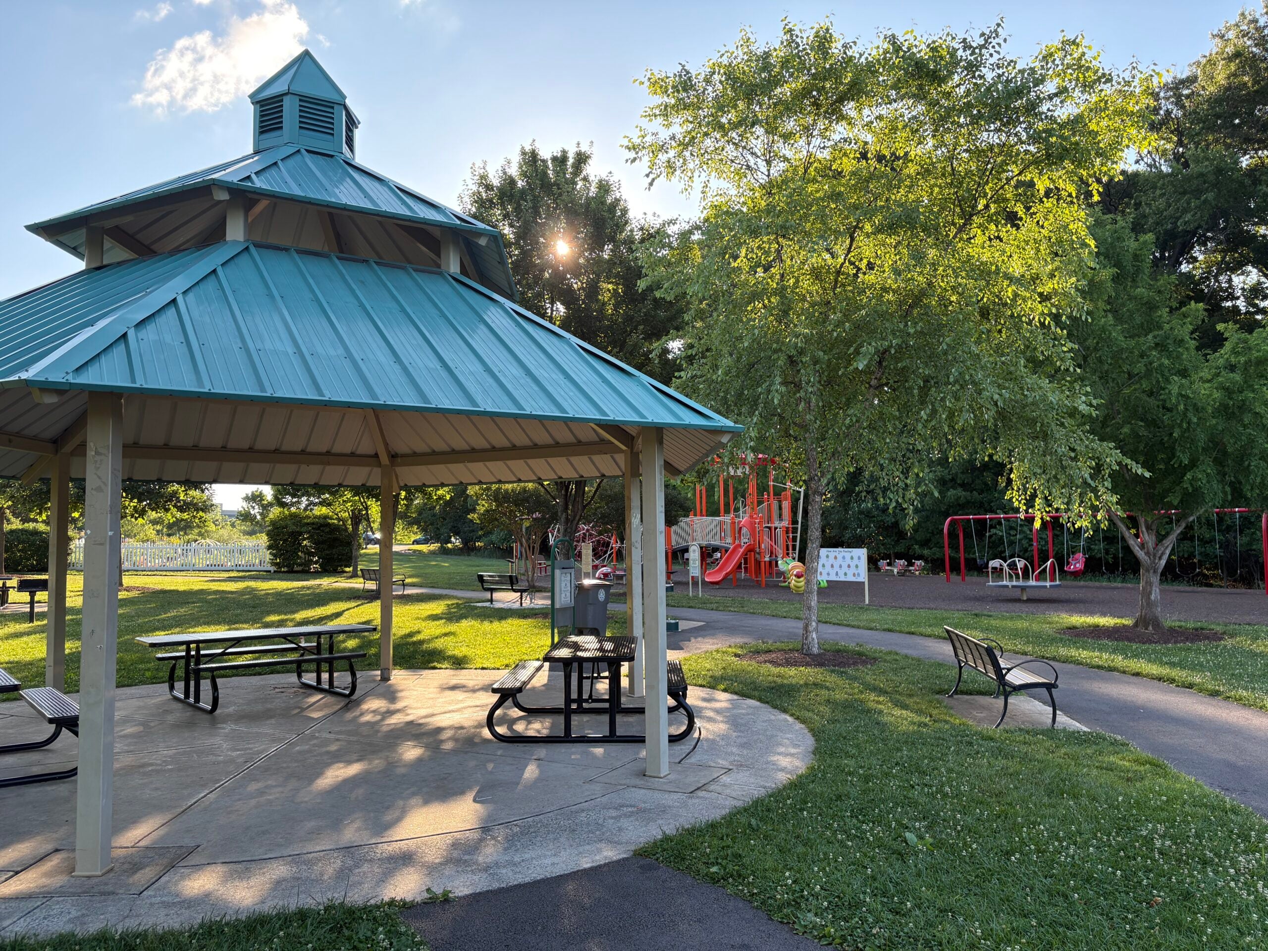 Fallsgrove Park features a pavilion equipped with tables and grills, available for rent, as well as a playground for community use.