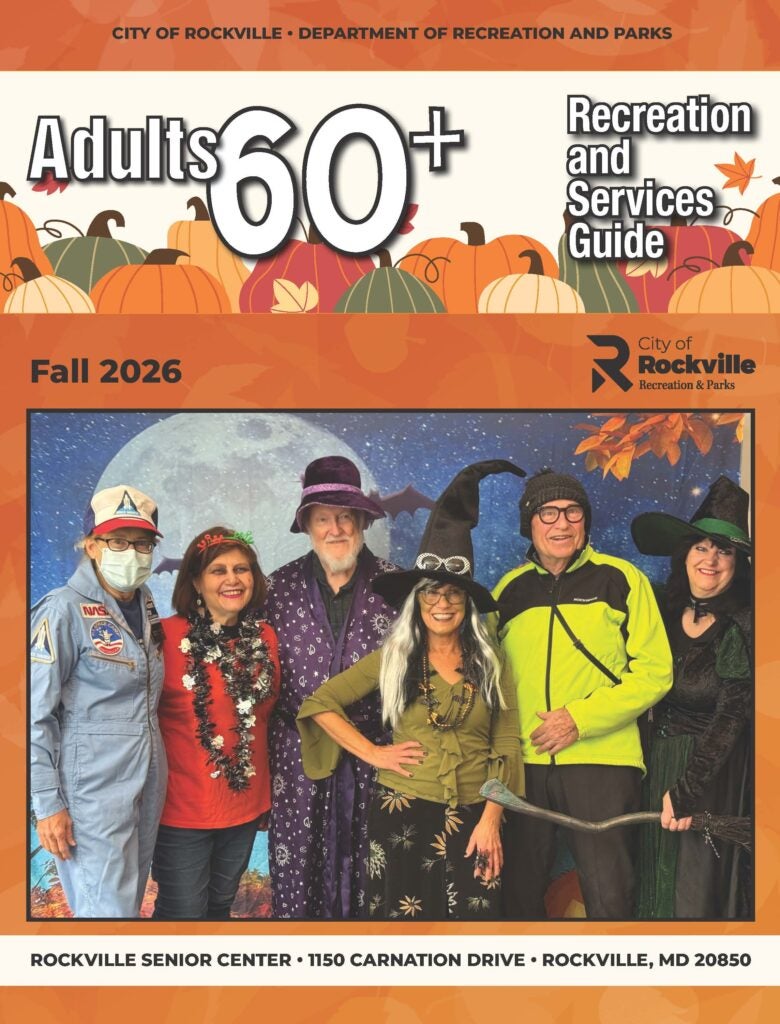Six adults in costumes pose in front of a decorated backdrop for the Fall 2026 City of Rockville Adults 60+ Recreation and Services Guide.