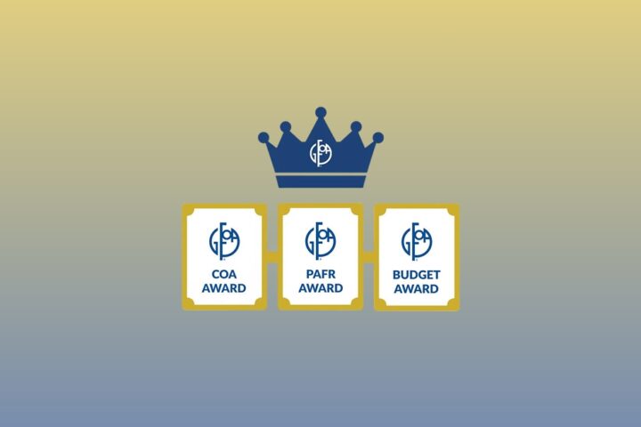 Three award plaques labeled COA, PAFR, and BUDGET AWARD sit beneath a blue crown on a yellow-to-blue gradient background.
